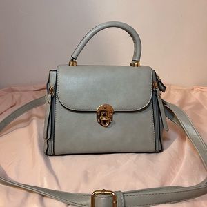 DETATCHABLE CROSS BODY HAND BAG -